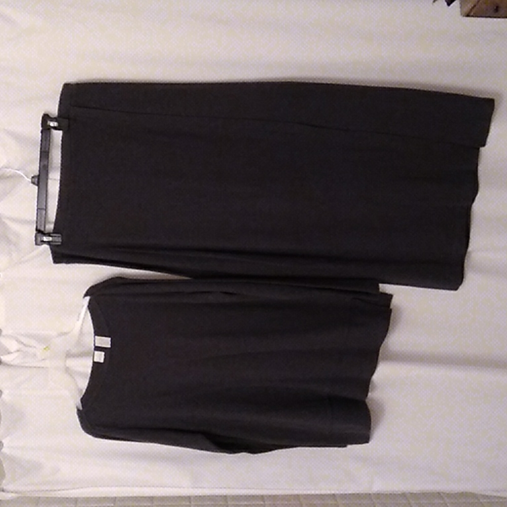 Cherokee top with long skirt,color grey size large. Skirt has a slit 18 inches.